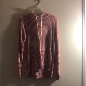 red and white pull over sweater